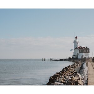 fotografo-paisaje-faro-marken-paises-bajos-arboles-rocas-hielo-lago.JPG